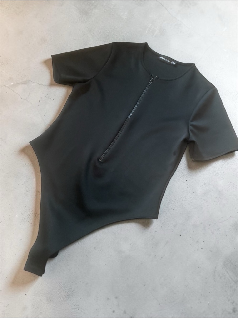 PrettyLittleThing Black Short-Sleeve Zip Front Bodysuit
